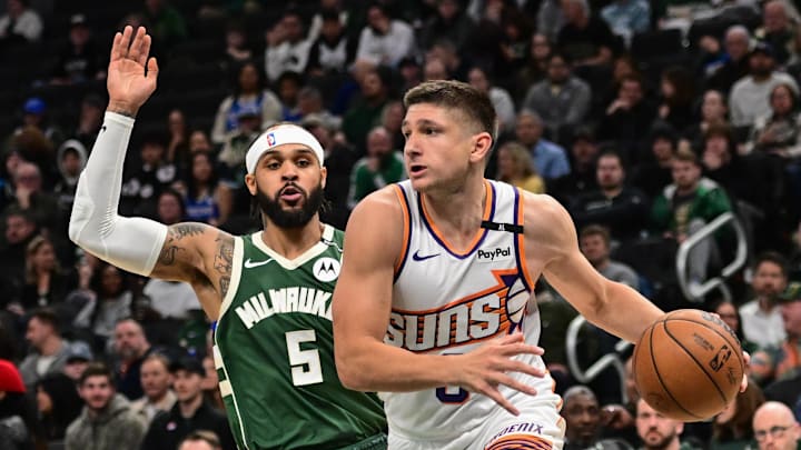 Apr 1, 2025; Milwaukee, Wisconsin, USA; Phoenix Suns guard Grayson Allen (8) drives for the basket against Milwaukee Bucks guard Gary Trent Jr. (5) in the second quarter at Fiserv Forum. Mandatory Credit: Benny Sieu-Imagn Images Apr 1, 2025; Milwaukee, Wisconsin, USA; Phoenix Suns guard Grayson Allen (8) drives for the basket against Milwaukee Bucks guard Gary Trent Jr. (5) in the second quarter at Fiserv Forum. Mandatory Credit: Benny Sieu-Imagn Images