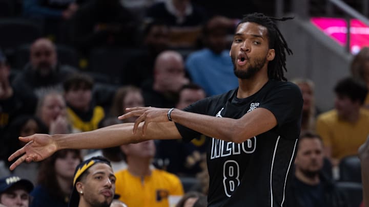 Mar 20, 2025; Indianapolis, Indiana, USA; Brooklyn Nets forward Ziaire Williams (8) celebrates a made basket in the second half against the Indiana Pacers at Gainbridge Fieldhouse. Mandatory Credit: Trevor Ruszkowski-Imagn Images