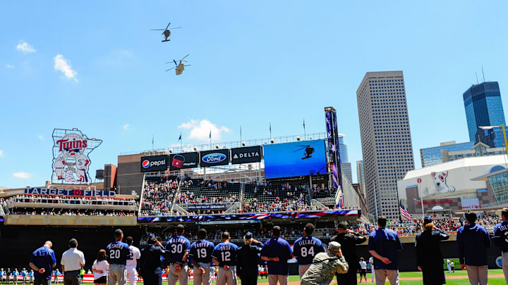 Jul 3, 2016; Minneapolis, MN, USA; Players watch a flyover during Armed Forces Appreciation Day prior to the game between the Minnesota Twins and the Texas Rangers at Target Field.  Mandatory Credit: Jeffrey Becker-Imagn Images