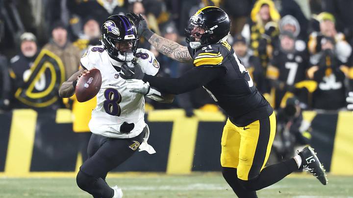 Jan 4, 2026; Pittsburgh, Pennsylvania, USA; Baltimore Ravens quarterback Lamar Jackson (8) scrambles with the ball as Pittsburgh Steelers linebacker Nick Herbig (51) cases during the fourth quarter at Acrisure Stadium. Mandatory Credit: Charles LeClaire-Imagn Images Jan 4, 2026; Pittsburgh, Pennsylvania, USA; Baltimore Ravens quarterback Lamar Jackson (8) scrambles with the ball as Pittsburgh Steelers linebacker Nick Herbig (51) cases during the fourth quarter at Acrisure Stadium. Mandatory Credit: Charles LeClaire-Imagn Images