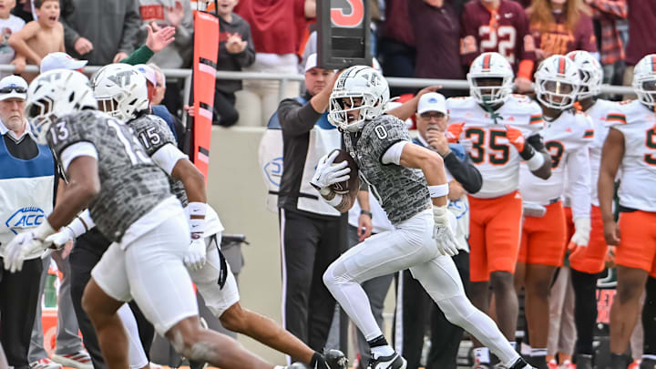 Nov 22, 2025; Blacksburg, Va.; Virginia Tech wide receiver Ayden Greene (0) runs after a catch vs. Miami.