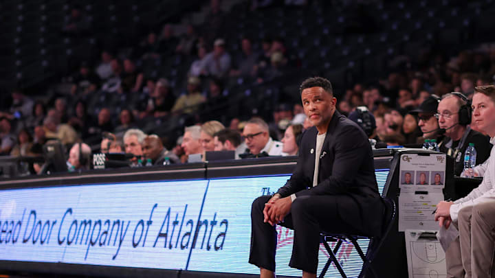 Feb 11, 2026; Atlanta, Georgia, USA; Georgia Tech Yellow Jackets head coach Damon Stoudamire on the bench against the Wake Forest Demon Deacons in the first quarter at McCamish Pavilion. Mandatory Credit: Brett Davis-Imagn Images