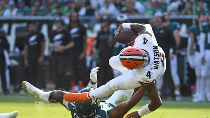 Oct 13, 2024; Philadelphia, Pennsylvania, USA; Cleveland Browns quarterback Deshaun Watson (4) is sacked by Philadelphia Eagles linebacker Josh Sweat (19) during the fourth quarter at Lincoln Financial Field. Mandatory Credit: Eric Hartline-Imagn Images