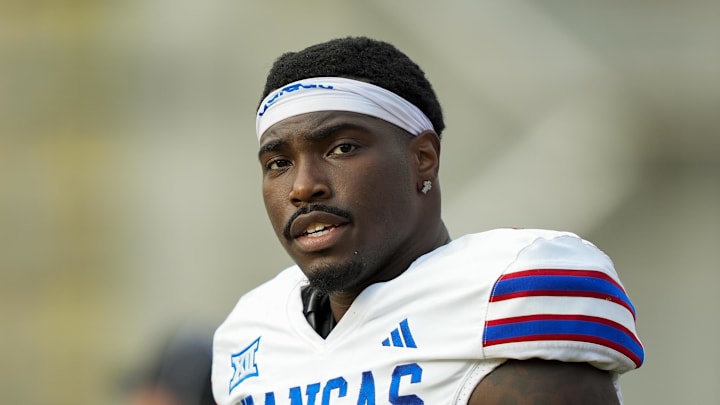 Sep 6, 2025; Columbia, Missouri, USA; Kansas Jayhawks quarterback Jalon Daniels (6) reacts during the second half against the Missouri Tigers at Faurot Field at Memorial Stadium. Mandatory Credit: Jay Biggerstaff-Imagn Images