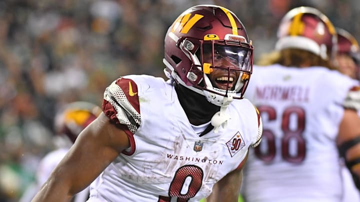 Washington Commanders running back Brian Robinson Jr. celebrates after scoring a touchdown vs. the Philadelphia Eagles in Week 10.