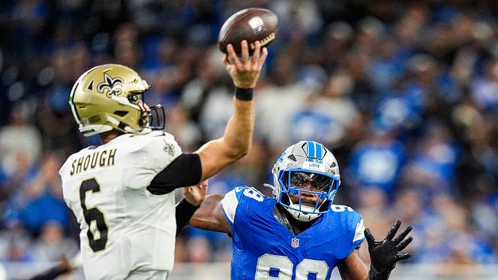 Detroit Lions edge rusher DJ Wonnum (98) presses New Orleans Saints quarterback Tyler Shough (6) during the second half at Ford Field in Detroit on Sunday, Sept. 13, 2026. Detroit Lions edge rusher DJ Wonnum (98) presses New Orleans Saints quarterback Tyler Shough (6) during the second half at Ford Field in Detroit on Sunday, Sept. 13, 2026.