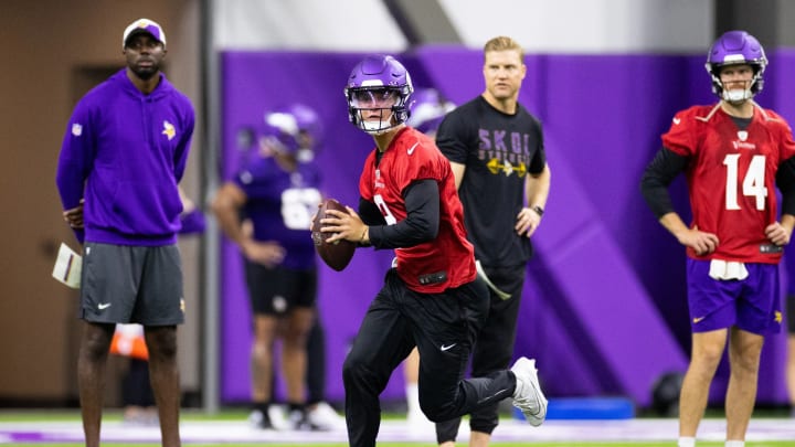 Vikings QBs J.J. McCarthy and Sam Darnold at an offseason practice. Vikings QBs J.J. McCarthy and Sam Darnold at an offseason practice.