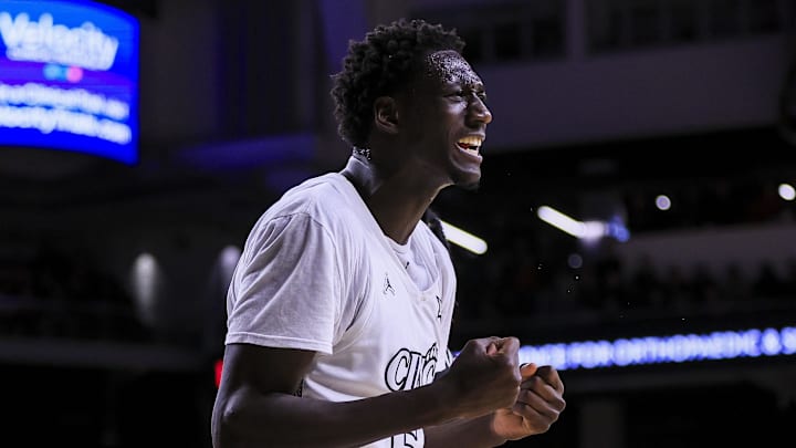 Jan 21, 2025; Cincinnati, Ohio, USA; Cincinnati Bearcats forward Aziz Bandaogo (55) reacts after a foul called in the second half in the game against the Texas Tech Red Raiders at Fifth Third Arena. Mandatory Credit: Katie Stratman-Imagn Images Jan 21, 2025; Cincinnati, Ohio, USA; Cincinnati Bearcats forward Aziz Bandaogo (55) reacts after a foul called in the second half in the game against the Texas Tech Red Raiders at Fifth Third Arena. Mandatory Credit: Katie Stratman-Imagn Images