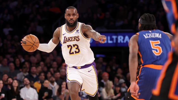 Feb 3, 2024; New York, New York, USA; Los Angeles Lakers forward LeBron James (23) brings the ball up court against New York Knicks forward Precious Achiuwa (5) during the second quarter at Madison Square Garden. Mandatory Credit: Brad Penner-USA TODAY Sports Feb 3, 2024; New York, New York, USA; Los Angeles Lakers forward LeBron James (23) brings the ball up court against New York Knicks forward Precious Achiuwa (5) during the second quarter at Madison Square Garden. Mandatory Credit: Brad Penner-USA TODAY Sports