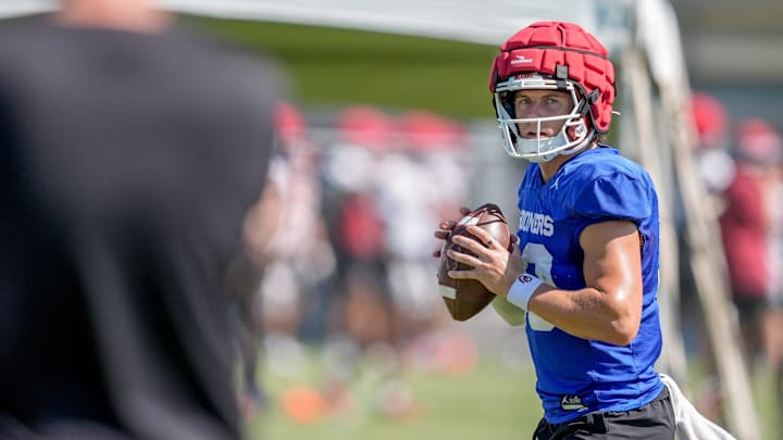 John Mateer runs drills during football practice for the Oklahoma Sooners. John Mateer runs drills during football practice for the Oklahoma Sooners.