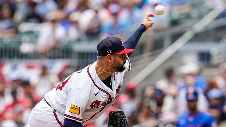 Jul 5, 2026; Cumberland, Georgia, USA; Atlanta Braves pitcher Martin Perez (33) pitches against the New York Mets during the first inning at Truist Park. Mandatory Credit: Dale Zanine-Imagn Images