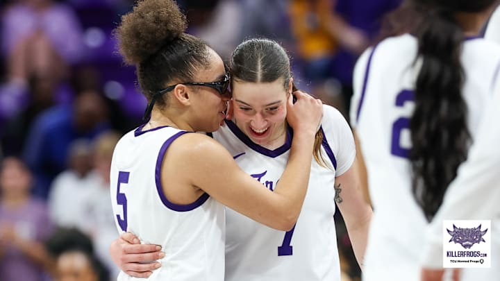 Olivia Miles and Marta Suarez share a moment during TCU's battle with West Virginia. Olivia Miles and Marta Suarez share a moment during TCU's battle with West Virginia.