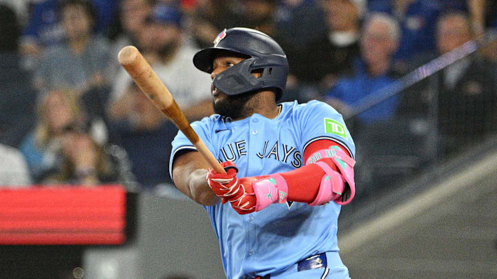 Toronto Blue Jays designated hitter Vladimir Guerrero Jr. (27) hits a two run RBI double against the Boston Red Sox in the third inning at Rogers Centre on Sept 24.