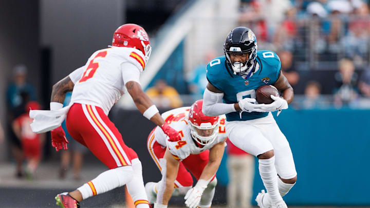 Aug 10, 2024; Jacksonville, Florida, USA; Jacksonville Jaguars wide receiver Gabe Davis (0) runs the ball after a pass during the first quarter against the Kansas City Chiefs at EverBank Stadium. Mandatory Credit: Douglas DeFelice-Imagn Images