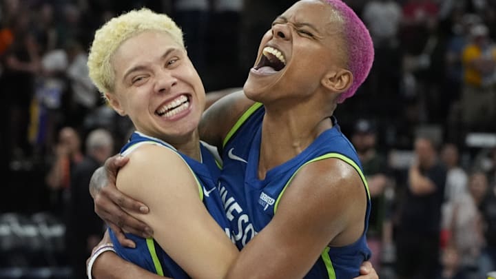 Jun 21, 2025; Minneapolis, Minnesota, USA; Minnesota Lynx guard Natisha Hiedeman (2) and guard Courtney Williams (10) celebrate the win over the Los Angeles Sparks after the game at Target Center. Mandatory Credit: Bruce Kluckhohn-Imagn Images