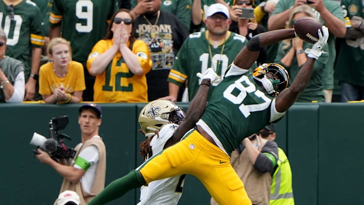 Green Bay Packers wide receiver Romeo Doubs (87) catches an 8-yard touchdown pass to help beat the Saints last year.