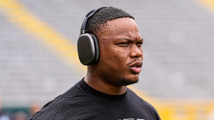 Detroit Lions running back David Montgomery (5) warms up ahead of the Green Bay Packers game at Lambeau Field in Green Bay, Wis., on Sunday, September 7, 2025.