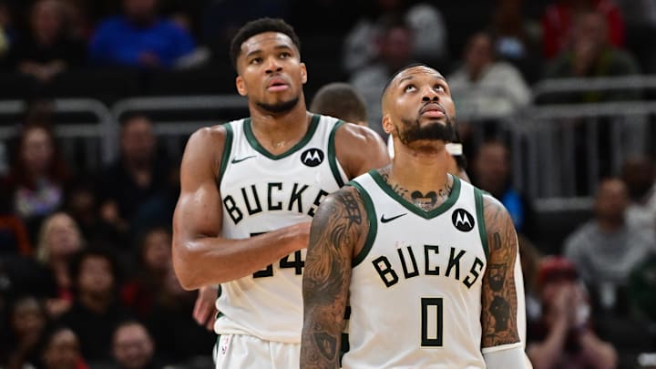 Oct 14, 2024; Milwaukee, Wisconsin, USA; Milwaukee Bucks forward Giannis Antetokounmpo (34) and guard Damian Lillard (0) look on in the second quarter against the Chicago Bulls at Fiserv Forum. Mandatory Credit: Benny Sieu-Imagn Images Oct 14, 2024; Milwaukee, Wisconsin, USA; Milwaukee Bucks forward Giannis Antetokounmpo (34) and guard Damian Lillard (0) look on in the second quarter against the Chicago Bulls at Fiserv Forum. Mandatory Credit: Benny Sieu-Imagn Images