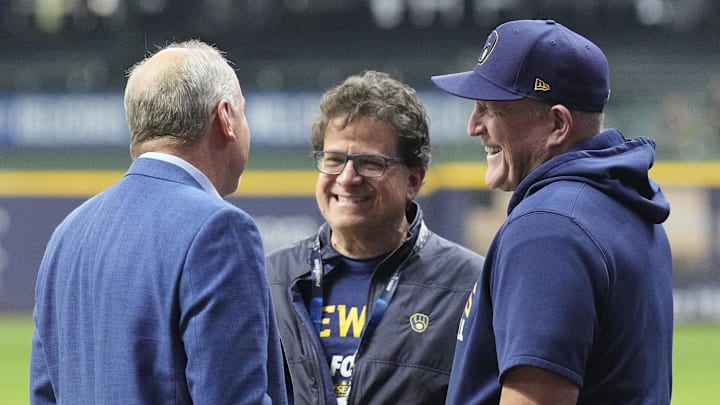 Oct 11, 2025; Milwaukee, Wisconsin, USA; Milwaukee Brewers owner Mark Attanasio and manager Pat Murphy talk before game five against the Chicago Cubs in the NLDS round for the 2025 MLB playoffs at American Family Field. Mandatory Credit: Michael McLoone-Imagn Images Oct 11, 2025; Milwaukee, Wisconsin, USA; Milwaukee Brewers owner Mark Attanasio and manager Pat Murphy talk before game five against the Chicago Cubs in the NLDS round for the 2025 MLB playoffs at American Family Field. Mandatory Credit: Michael McLoone-Imagn Images