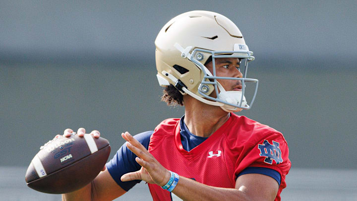 Notre Dame quarterback Kenny Minchey throws the ball during a Notre Dame football practice at Irish Athletic Center on Wednesday, July 31, 2024, in South Bend.