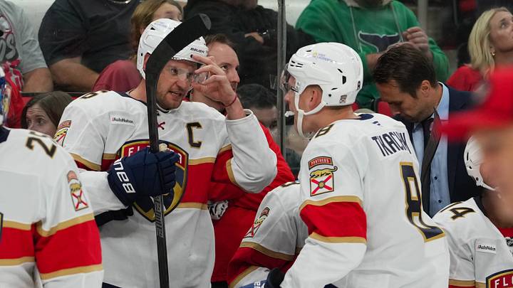 Sep 29, 2026; Raleigh, North Carolina, USA;  Florida Panthers center Aleksander Barkov (16) talks to left wing Brady Tkachuk (8) during the first period against the Carolina Hurricanes at Lenovo Center.  Mandatory Credit: James Guillory-Imagn Images