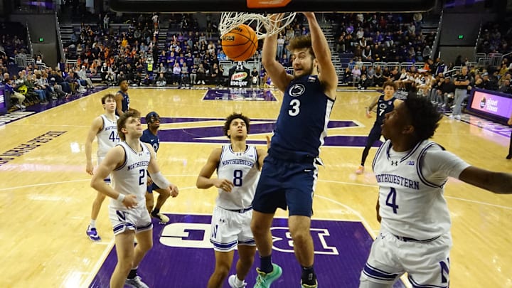 Penn State Nittany Lions forward Ivan Juric (3) dunks the ball on Northwestern Wildcats guard Jayden Reid (4) during the second half at Welsh-Ryan Arena. 