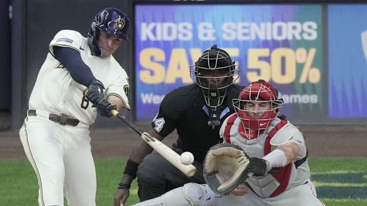Sep 1, 2025; Milwaukee, Wisconsin, USA; Milwaukee Brewers outfielder Isaac Collins (6) hits drives in two runs on a single during the eighth inning of their game against the Philadelphia Phillies Monday, September 1, 2025 at American Family Field in Milwaukee, Mandatory Credit: Mark Hoffman/USA TODAY Network via Imagn Images Sep 1, 2025; Milwaukee, Wisconsin, USA; Milwaukee Brewers outfielder Isaac Collins (6) hits drives in two runs on a single during the eighth inning of their game against the Philadelphia Phillies Monday, September 1, 2025 at American Family Field in Milwaukee, Mandatory Credit: Mark Hoffman/USA TODAY Network via Imagn Images