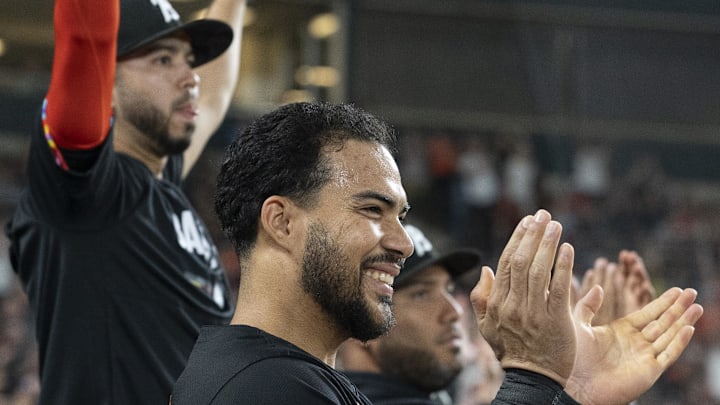 Sep 20, 2024; Baltimore, Maryland, USA;  Baltimore Orioles outfielder Anthony Santander (25) reacts with teammates after outfielder Colton Cowser (not pictured) second inning solo home run against the Detroit Tigers at Oriole Park at Camden Yards. Mandatory Credit: Tommy Gilligan-Imagn Images