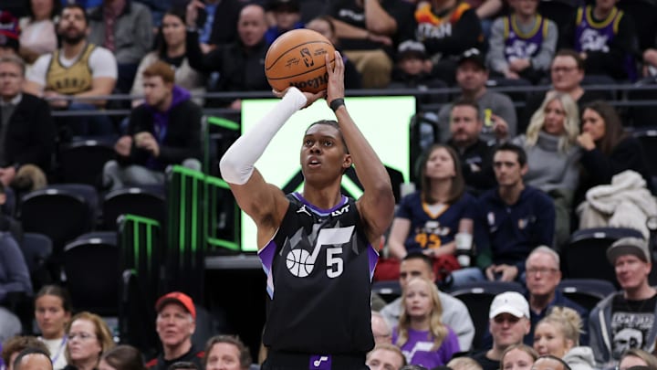 Mar 14, 2025; Salt Lake City, Utah, USA;  Utah Jazz forward Cody Williams (5) shoots the ball during the first quarter against the Toronto Raptors at Delta Center. Mandatory Credit: Chris Nicoll-Imagn Images