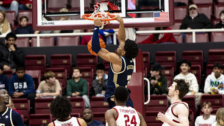 Feb 7, 2026; Stanford, California, USA;  Georgia Tech Yellow Jackets guard Jaeden Mustaf (3) dunks the ball against the Stanford Cardinal during the first half at Maples Pavilion. Mandatory Credit: John Hefti-Imagn Images