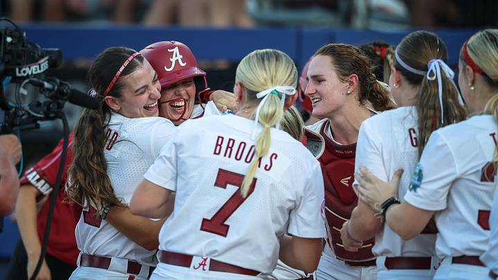 Brooke Wells celebrates home run against UCLA at WCWS Brooke Wells celebrates home run against UCLA at WCWS