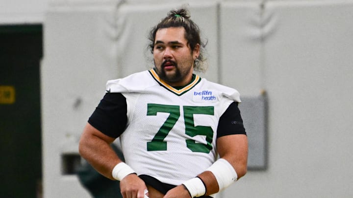 Jun 11, 2025; Green Bay, WI, USA;  Green Bay Packers offensive tackle Sean Rhyan (75) participates in the team's minicamp at Ray Nitschke Field. Mandatory Credit: Benny Sieu-Imagn Images