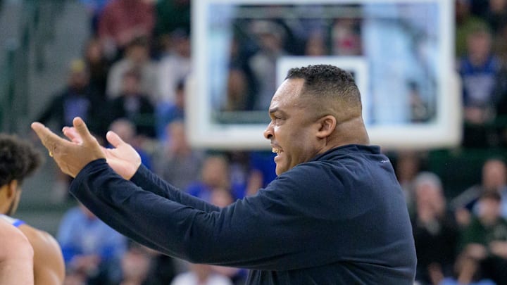 Jan 21, 2024; New Orleans, Louisiana, USA; Tulane Green Wave head coach Ron Hunter pumps up the crowd during the first half against the Memphis Tigers at Avron B. Fogelman Arena in Devlin Fieldhouse.