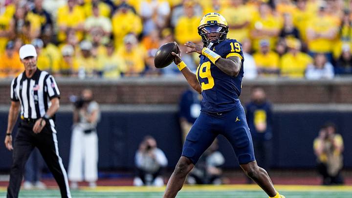 ]Michigan quarterback Bryce Underwood (19) makes a pass against Iowa during the second half at Michigan Stadium in Ann Arbor on Saturday, Sept. 26, 2026.