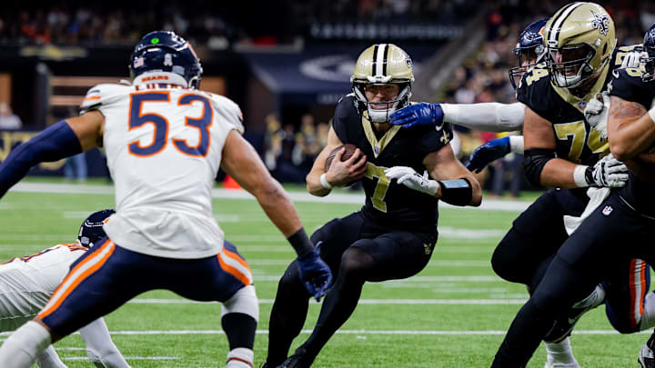 Nov 5, 2023; New Orleans, Louisiana, USA;  New Orleans Saints quarterback Taysom Hill (7) is stopped at the 1 yard line by Chicago Bears linebacker T.J. Edwards (53) during the first half at the Caesars Superdome. Mandatory Credit: Stephen Lew-Imagn Images