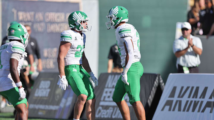 Sep 20, 2025; West Point, New York, USA; North Texas Mean Green running back Caleb Hawkins (24) celebrates his touchdown against the Army Black Knights during the second half at Michie Stadium. Mandatory Credit: Danny Wild-Imagn Images