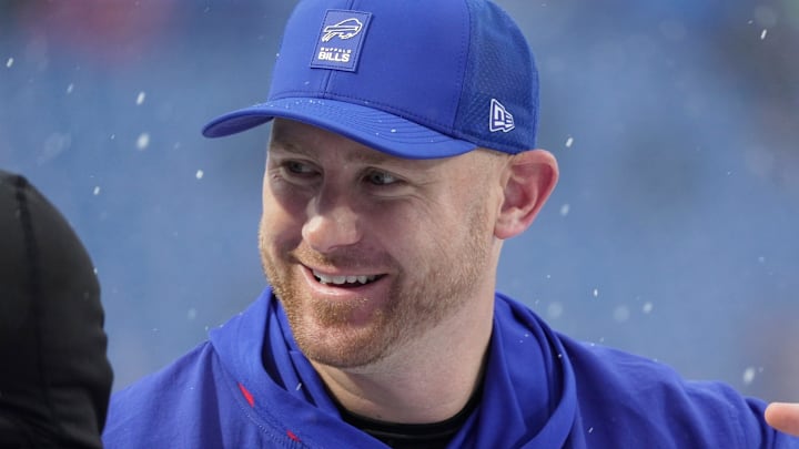 Buffalo Bills offensive coordinator Joe Brady greets players as they take the field before their game against the Bengals at Highmark Stadium in Orchard Park on Dec. 7, 2025.