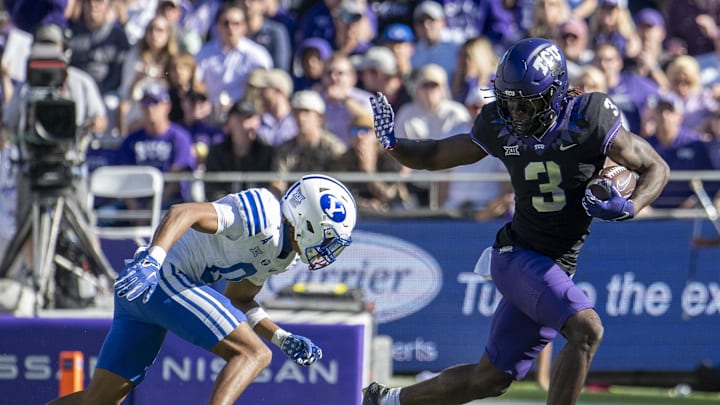 Green Bay Packers receiver Savion Williams stiff-arms a defender while at TCU last season.