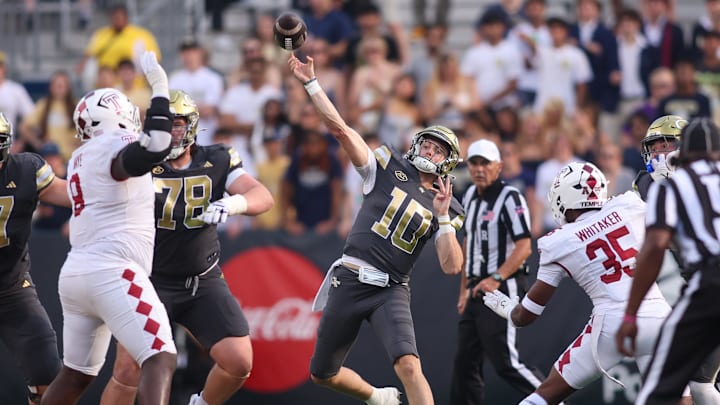 Sep 20, 2025; Atlanta, Georgia, USA; Georgia Tech Yellow Jackets quarterback Haynes King (10) throws a pass against the Temple Owls in the first quarter at Bobby Dodd Stadium at Hyundai Field. Mandatory Credit: Brett Davis-Imagn Images
