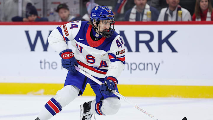 Jan 2, 2026; St. Paul, Minnesota, UNITED STATES; United States forward Cole Hutson (44) skates with the puck during the first period in the quarterfinals of the 2026 IIHF World Junior Championship against Finland at Grand Casino Arena. Mandatory Credit: Matt Krohn-Imagn Images