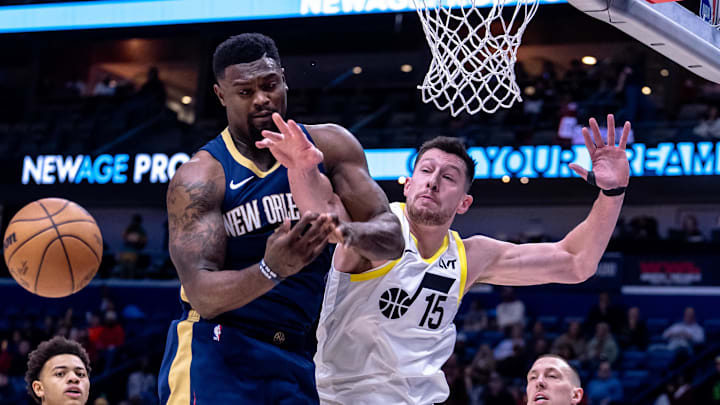 Jan 17, 2025; New Orleans, Louisiana, USA; New Orleans Pelicans forward Zion Williamson (1) has a shot blocked by Utah Jazz forward Drew Eubanks (15) during the first half at Smoothie King Center. Mandatory Credit: Stephen Lew-Imagn Images