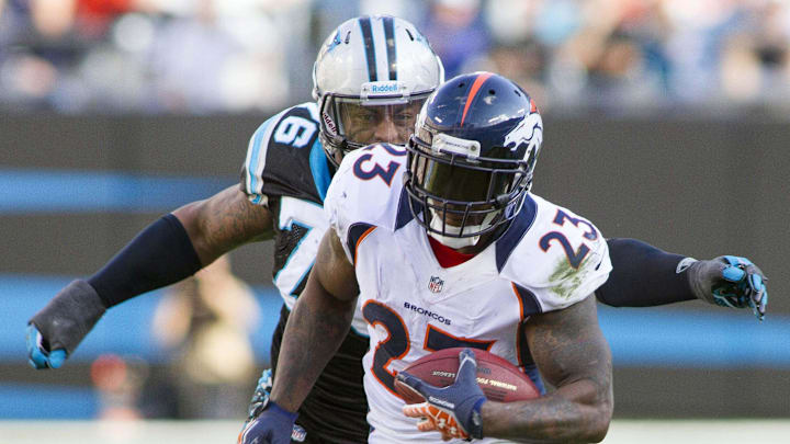 Nov 11, 2012; Charlotte, NC, USA  Denver Broncos running back Willis McGahee (23) runs the ball against the Carolina Panthers.