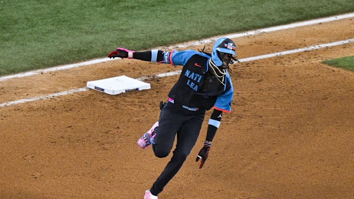 Jul 16, 2024; Arlington, Texas, USA; National League shortstop Elly De La Cruz of the Cincinnati Reds (44) hits a single against the American League during the seventh inning of the 2024 MLB All-Star game at Globe Life Field. Mandatory Credit: Jerome Miron-Imagn Images