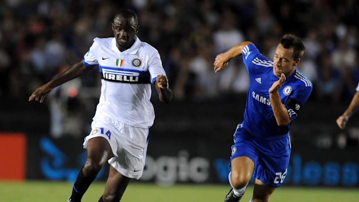 Jul 21, 2009; Pasadena, CA, USA; Inter Milan player Patrick Vieira (left) is defended by Chelsea player John Terry (right) in the first half in the World Football Challenge at the Rose Bowl. Mandatory Credit: Kirby Lee/Image of Sport-Imagn Images