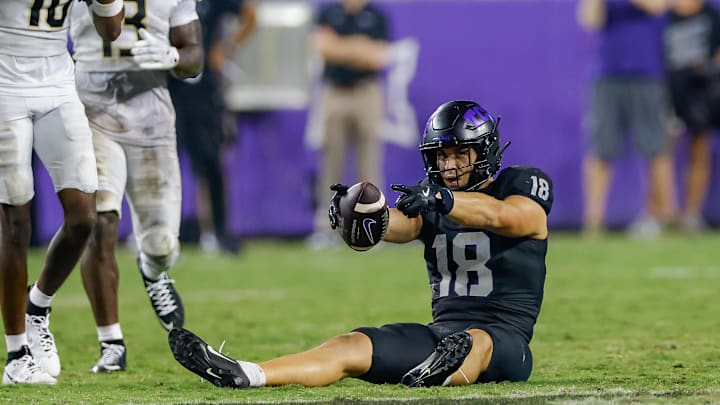TCU Horned Frogs wide receiver Jack Bech (18) signals first down after a catch during the fourth quarter against the UCF Knights at Amon G. Carter Stadium. 