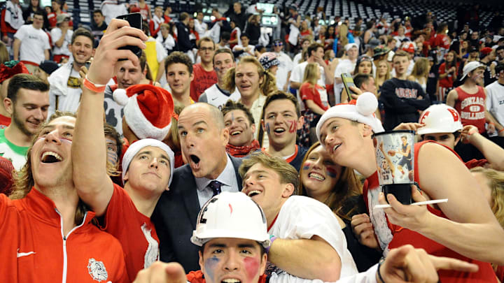 Dec 5, 2015; Spokane, WA, USA; ESPN basketball analyst Jay Bilas (center) poses for selfie prior to a Arizona Wildcats at Gonzaga Bulldogs men's basketball game at McCarthey Athletic Center. Mandatory Credit: James Snook-Imagn Images