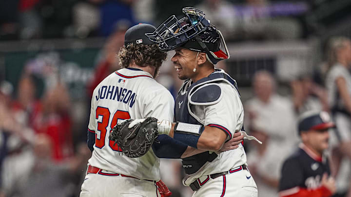 Atlanta Braves relief pitcher Pierce Johnson (38) and catcher Drake Baldwin