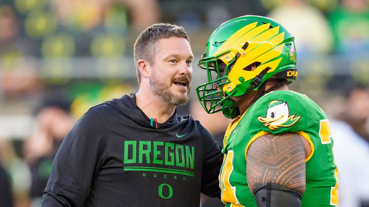 Oregon head coach Dan Lanning, left, talks to Oregon offensive lineman Dave Iuli as the Oregon Ducks host the Portland State Vikings on Sept. 18, 2026, at Autzen Stadium in Eugene, Oregon. Oregon head coach Dan Lanning, left, talks to Oregon offensive lineman Dave Iuli as the Oregon Ducks host the Portland State Vikings on Sept. 18, 2026, at Autzen Stadium in Eugene, Oregon.
