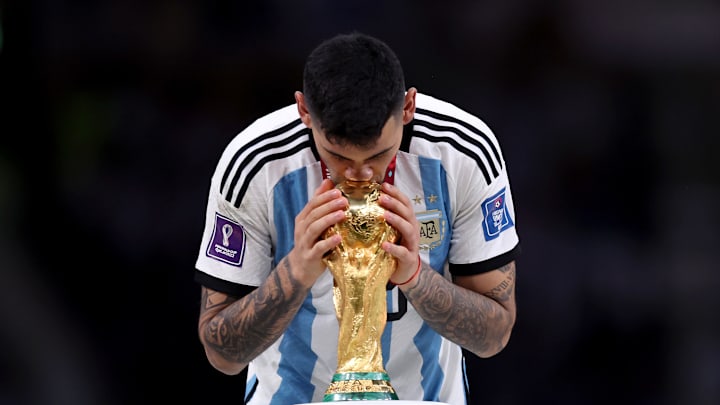 Cristian Romero celebrates winning the World Cup 