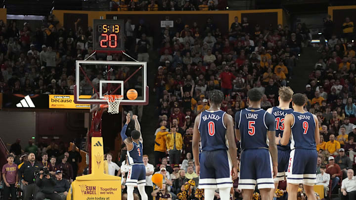 Feb 1, 2025; Tempe, Ariz., U.S.; Arizona Wildcats guard Caleb Love (1) shoots a technical foul during a Big 12 menÕs basketball game against the Arizona State Sun Devils at Desert Financial Arena.